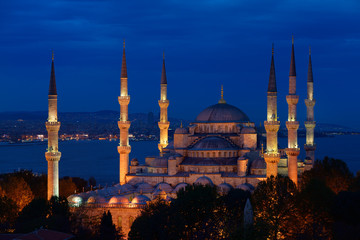Blue Mosque with lights at dusk on the Bosphorus Sultanahmet Istanbul Turkey