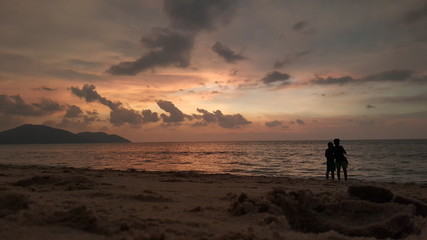 Fototapeta na wymiar Clouds and Sunset over sea