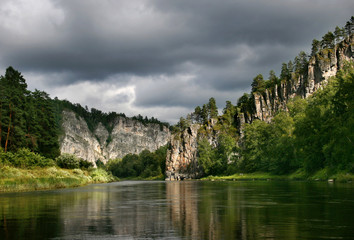 Summer landscape with reflection in the river