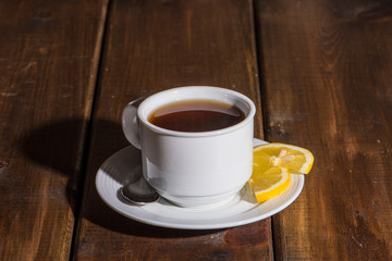 Cup of fresh tea and spoon