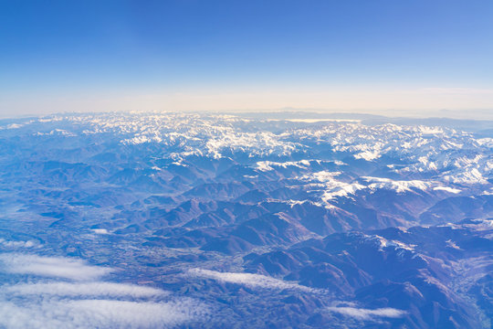 Flight over the snow capped mountains of the Pyrenees