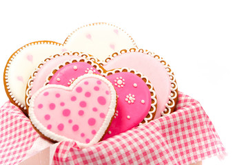Set of pink heart shaped cookies with patterns, handmade