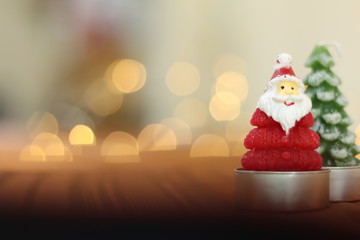 Selection of meat grilling over the coals on a portable barbecue with spicy sausages, beef kebabs and racks of ribs, outdoors on green grass with copyspace