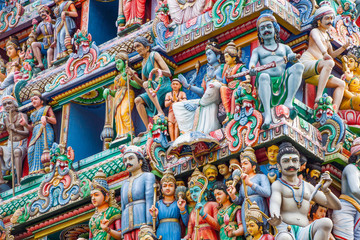Fototapeta na wymiar colorful dome of a hindu temple. Hinduism. statues of hindu gods and goddesses
