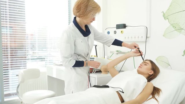 Center for Cosmetology. Young girl patient in recovery clinic on cosmetic procedures.