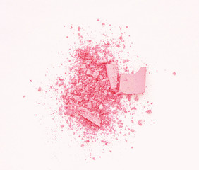 Makeup cosmetics. Eyeshadow crushed palette, colourful eye shadow powder on light background
