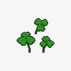 Pixel art cartoon clover leaf icon set.