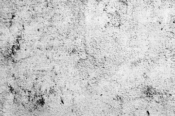 Texture of a concrete wall with cracks and scratches which can be used as a background