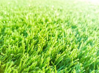 Close up green artificial grass for the background
