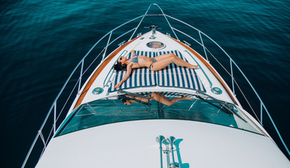 girl on a yacht with a beautiful view of lake Baikal, travel in Russia