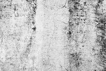 Texture of a concrete wall with cracks and scratches which can be used as a background