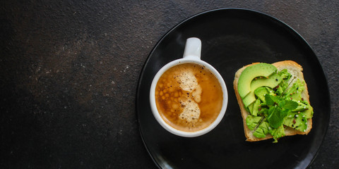 avocado sandwich, healthy food (bread toast snack) menu concept. food background. top view. copy space