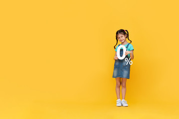 Fototapeta na wymiar Cute little girl showing 0% number on yellow background