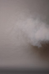 Smoke on a photographic background in the studio 50 MP