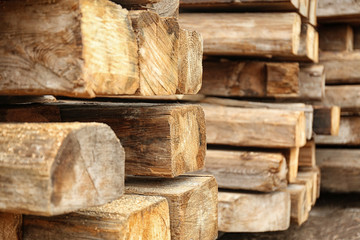 Stack of firewood, closeup view. Heating in winter