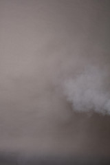 Fototapeta premium Smoke on a photographic background in the studio 50 MP
