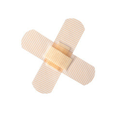 Medical sticking plasters isolated on white. First aid item