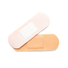 Medical sticking plasters isolated on white. First aid item