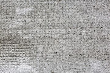 Grey divided in parts concrete damaged texture, wallpaper and background, close-up. Grunge rusty design, decoration and exterior or interior details concept