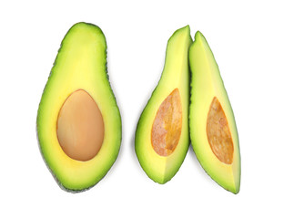 Tasty ripe avocados on white background, top view. Tropical fruit
