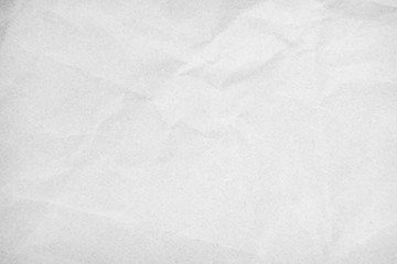 White recycled craft paper texture as background. Grey paper texture, Old vintage page or grunge vignette of old newspaper. Pattern rough art creased grunge letter. Hardboard with copy space for text.