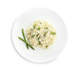 Delicious risotto with asparagus isolated on white, top view