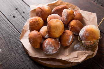 Bunuelos de viento - traditional Colombian sweet deep fried pastry. Spanish Easter doughnut. Mexican golden, crispy-sweet, tortilla-like fritters are sprinkled with sugar