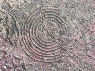 Old islamic tomb stone at old cemetry with writings.