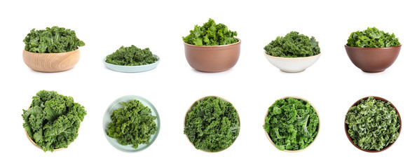Set of fresh green kale leaves on white background