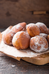 Bunuelos de viento - traditional Colombian sweet deep fried pastry. Spanish Easter doughnut. Mexican golden, crispy-sweet, tortilla-like fritters are sprinkled with sugar