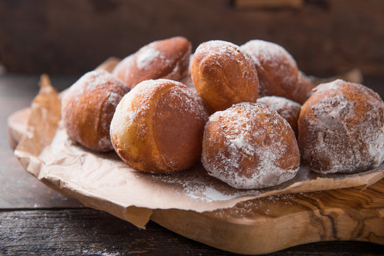 Bunuelos de viento - traditional Colombian sweet deep fried pastry. Spanish Easter doughnut. Mexican golden, crispy-sweet, tortilla-like fritters are sprinkled with sugar