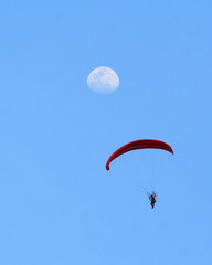 paramotor is flying to the moon 