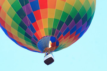 Obraz premium colorful rainbow balloon is flying to the sky