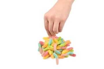 Female hand holding jelly sweets isolated on white