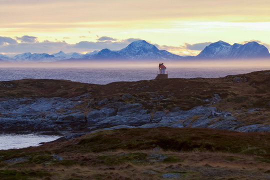 lighthouse on coast of sea in Norway