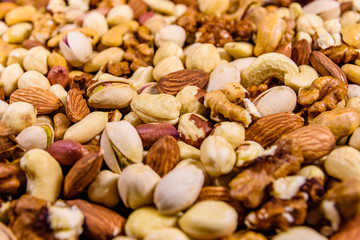 Background of the various nuts (almond, cashew, hazelnut, pistachio, walnut). Vegetarian meal. Healthy eating concept