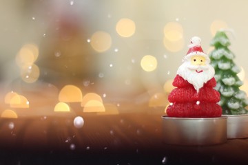 Selection of meat grilling over the coals on a portable barbecue with spicy sausages, beef kebabs and racks of ribs, outdoors on green grass with copyspace