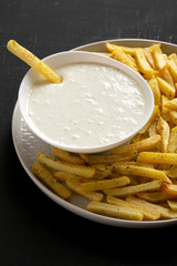 Homemade Crispy Ranch Fries, low angle view. Close-up.
