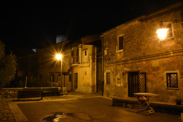 Night view of the houses of a medieval village in Italy