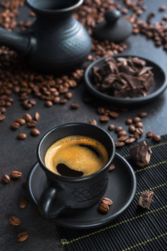 Turkish espresso coffee in a black ceramic cup