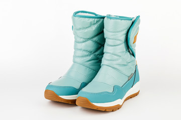 child winter blue boots on a white background