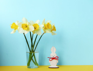 Easter  background with daffodils and eggs,nest,bunny