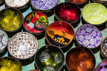 Souvenir colourfully lacquer bowls on the market at Luang Prabang in Laos. Homemade artworks by local people.