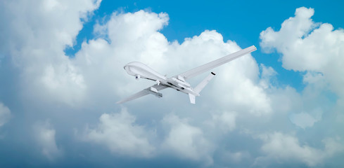Fototapeta na wymiar military RC military drone flies flies against backdrop of beautiful clouds on blue sky background.
