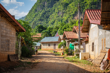 View of a road in a village Nong Khiaw, Laos. Nong Khiaw is a rustic little town on the bank of the Ou River.