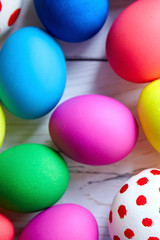 Fototapeta na wymiar Easter eggs background. Many colorful eggs, top view