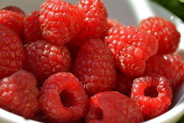 red fresh delicious raspberry berry in the afternoon for lunch