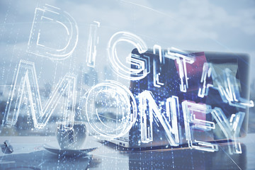 Double exposure of blockchain theme hologram and table with computer background. Concept of bitcoin crypto currency.