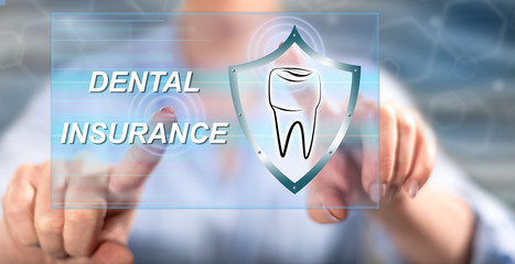 Woman touching a dental insurance concept