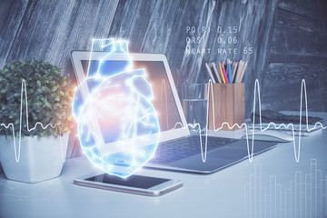 Desktop computer background and heart drawing. Double exposure. Medical study and healthcare concept.